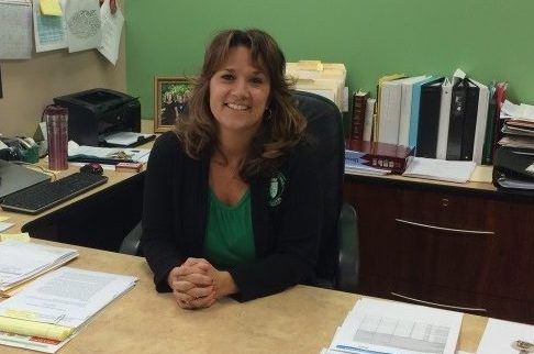 Mrs. Villont in her new office.