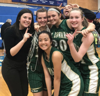 Manager Kelly Dalton celebrates the Lady Waves sectional victory with seniors Brittany Mauritzen and Taylor Schueler and juniors Maddison Knott and Yssa Sto. Domingo.