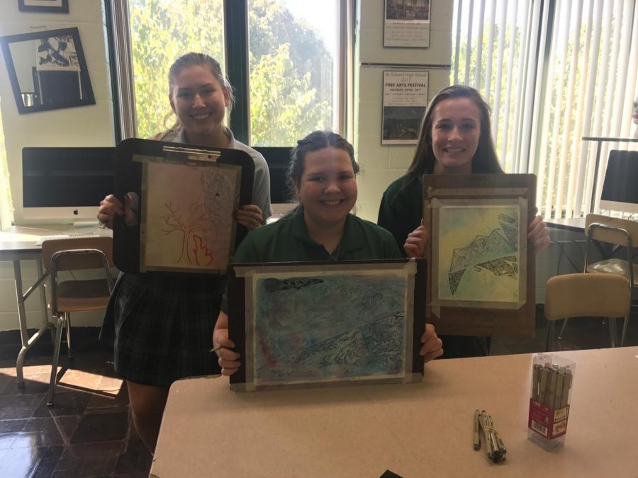 (From left) Lauren Biggins, Katie Sohoov, and Madison Knott. The students created these non-objective designs using ink on watercolor in advanced Art (Art III).