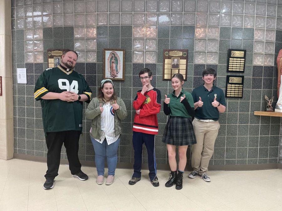St. Edward Poets: Fr. Blood, Ms. Adams, Louis Banet, Lily Burger, and Joey Lee.