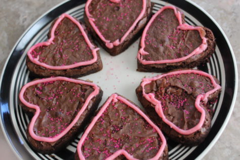 Making homemade heart-shaped brownies can be a perfect gift or activity!