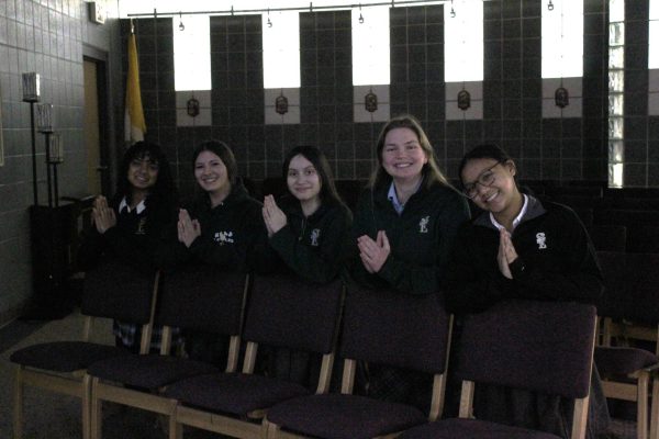 St. Edward students gather to pray for those affected by the California fires. 